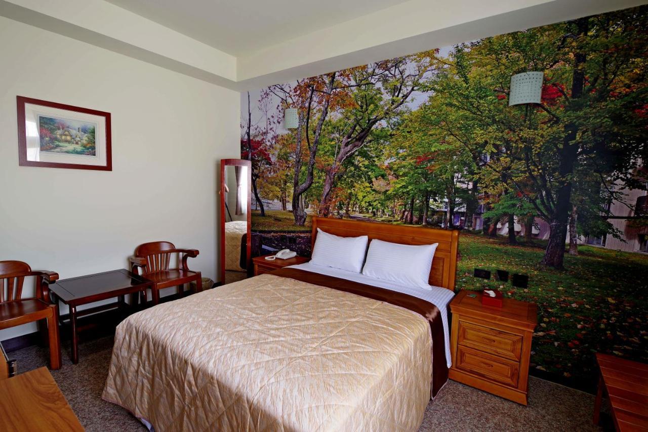 Hongfu Elegant Business Hotel Zhongli Bagian luar foto